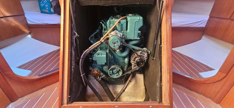  Yacht Photos Pics Engine compartment of a 2007 Dufour 425 Grand Large sailboat, showcasing the engine setup.