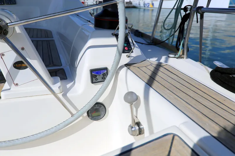  Yacht Photos Pics Steering wheel and controls of 2007 Dufour 425 Grand Large sailboat.