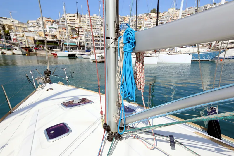  Yacht Photos Pics Dufour 425 Grand Large sailboat docked in marina, 2007 model, with cityscape background.