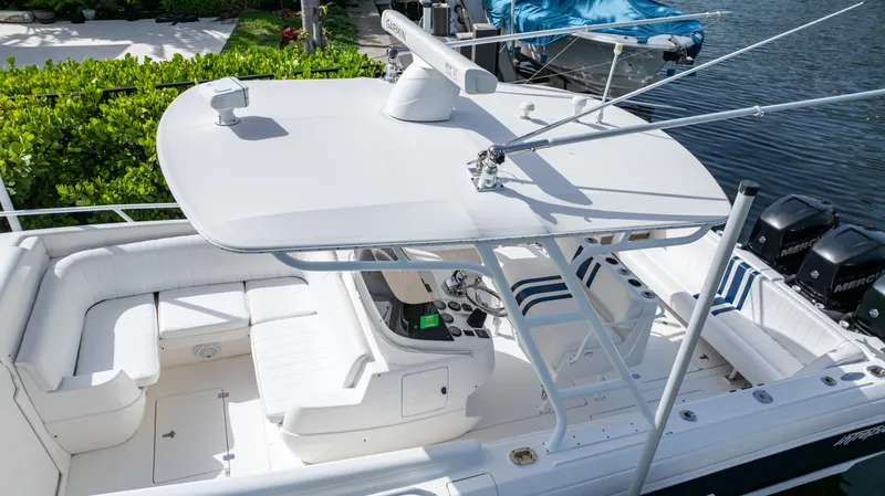  Yacht Photos Pics 2008 Intrepid 370 Cuddy boat with spacious seating and sleek design.