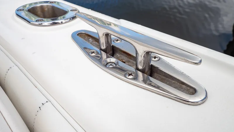  Yacht Photos Pics Stainless steel cleat on 2008 Intrepid 370 Cuddy boat deck.