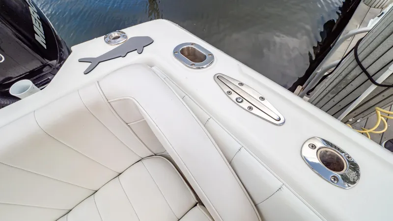  Yacht Photos Pics 2008 Intrepid 370 Cuddy boat interior with white seating and stainless steel fixtures.