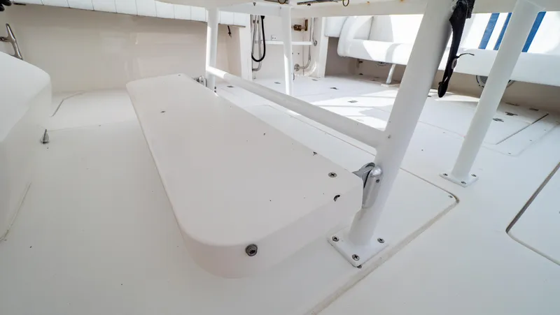  Yacht Photos Pics 2008 Intrepid 370 Cuddy boat interior with white seating and clean deck.