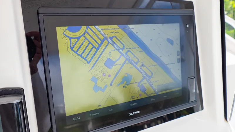  Yacht Photos Pics Garmin navigation display on 2008 Intrepid 370 Cuddy boat, showing detailed waterway map.