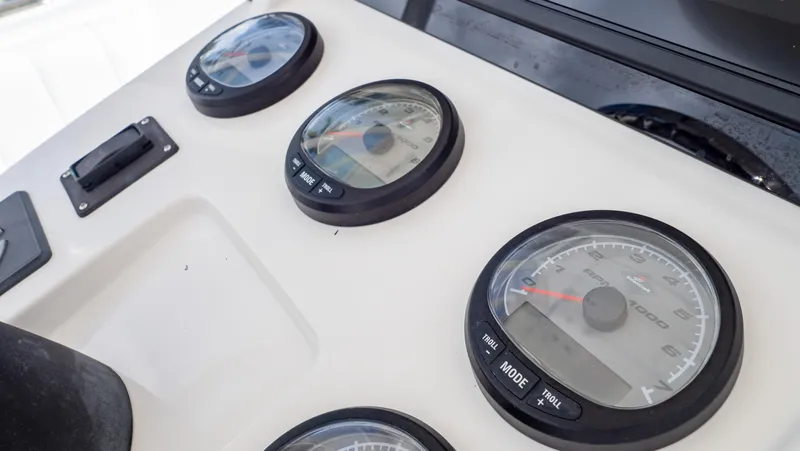  Yacht Photos Pics Dashboard gauges of a 2008 Intrepid 370 Cuddy boat.