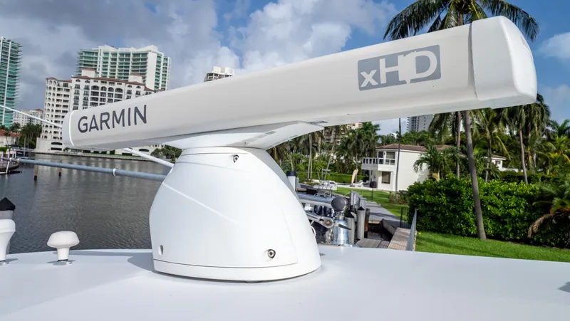  Yacht Photos Pics Garmin xHD radar on 2008 Intrepid 370 Cuddy, docked near waterfront homes.