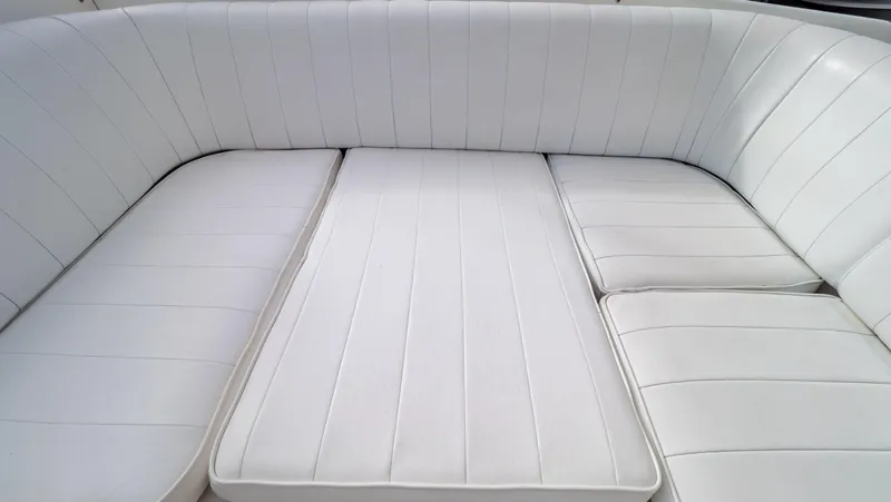  Yacht Photos Pics White cushioned seating on a 2008 Intrepid 370 Cuddy boat.