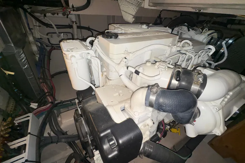 Skalywag VI Yacht Photos Pics Engine room of 2015 Sea Ray 470 Sundancer, showcasing detailed mechanical components.