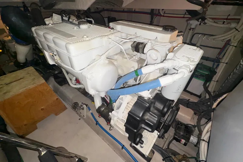 Skalywag VI Yacht Photos Pics Engine room of a 2015 Sea Ray 470 Sundancer, showcasing a clean, well-maintained engine.