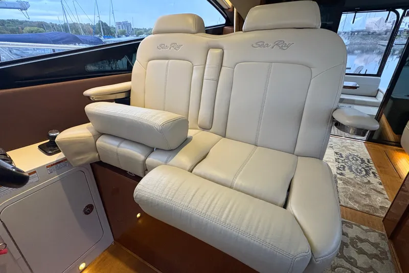 Skalywag VI Yacht Photos Pics Luxurious interior seating of 2015 Sea Ray 470 Sundancer yacht, featuring plush leather upholstery.