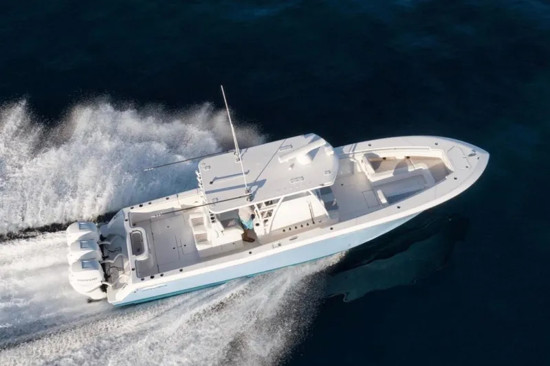  Yacht Photos Pics 2020 Invincible 36 Open Fisherman boat cruising on open water.