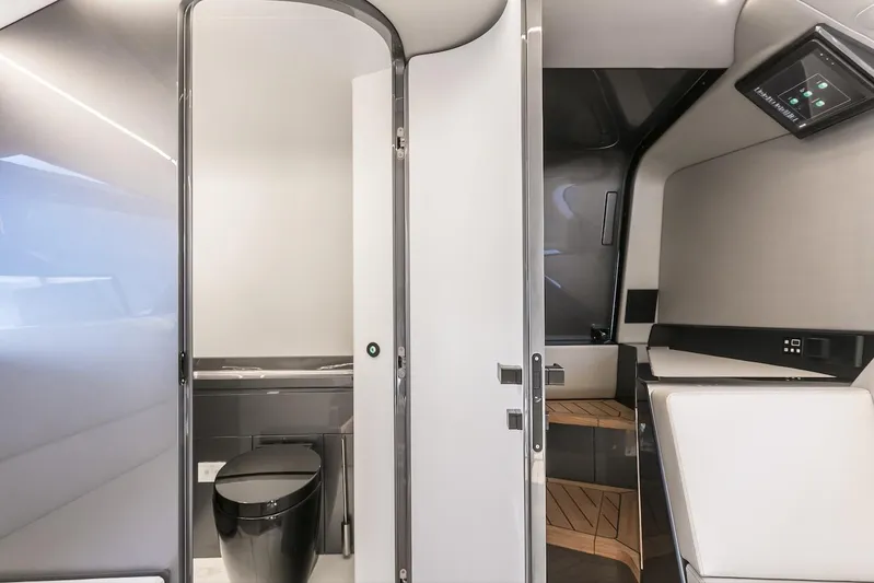  Yacht Photos Pics Luxurious 2026 Maori Yacht interior with modern bathroom and sleek design elements.