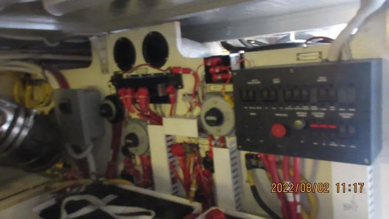  Yacht Photos Pics Electrical panel and wiring inside a 2004 Carver 450 Voyager Pilothouse boat.