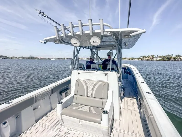 Fortuna Yacht Photos Pics 2021 SeaVee 370z boat on water, featuring spacious seating and modern design.