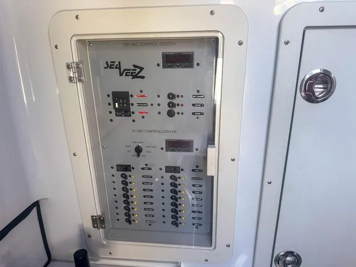 Fortuna Yacht Photos Pics Control panel of a 2021 SeaVee 370z boat, featuring 120VAC and 12VDC systems.