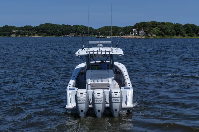 Fortuna Yacht Photos Pics 2021 SeaVee 370z boat with triple 400 engines on a calm lake.
