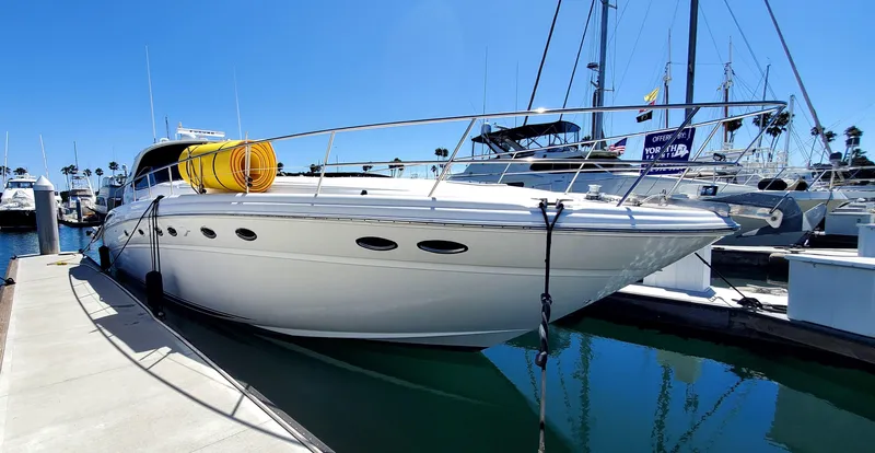 Sunbear Express Yacht Photos Pics 2001 Sea Ray 510 Sundancer yacht docked in marina under clear blue sky.