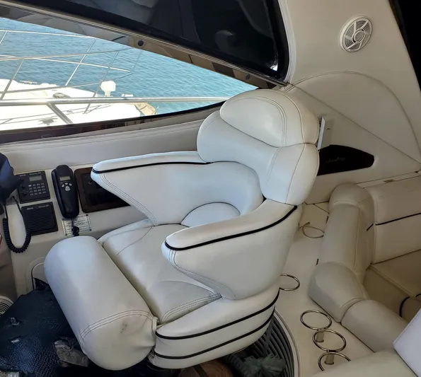 Sunbear Express Yacht Photos Pics Luxurious white leather seating in 2001 Sea Ray 510 Sundancer yacht interior.
