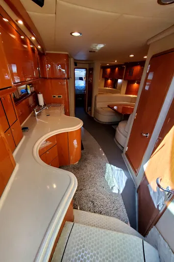 Sunbear Express Yacht Photos Pics Luxurious interior of 2001 Sea Ray 510 Sundancer yacht with modern amenities.