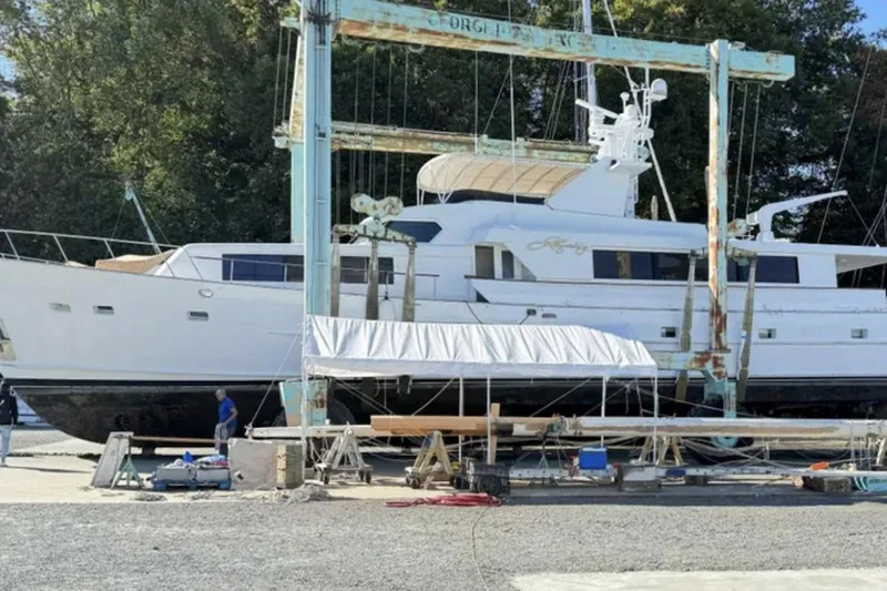 Liquidity Yacht Photos Pics 1984 Broward Raised Pilothouse yacht in dry dock for maintenance.