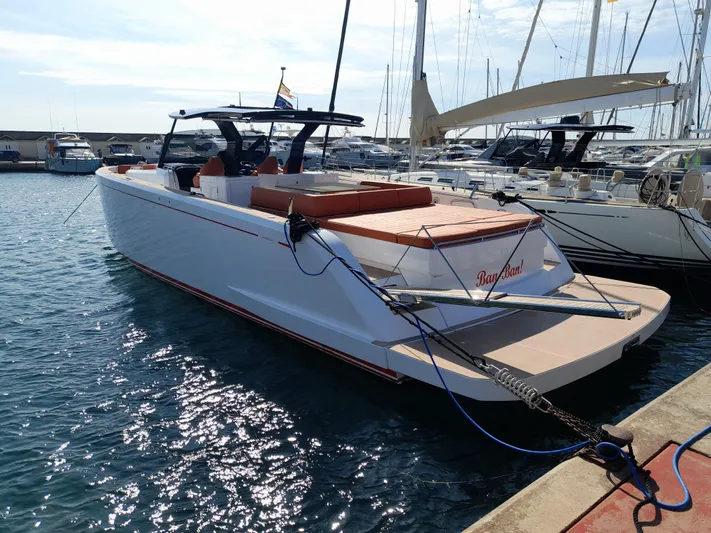  Yacht Photos Pics 2023 Pardo Yachts 50 docked in a marina, sleek design, sunny day.