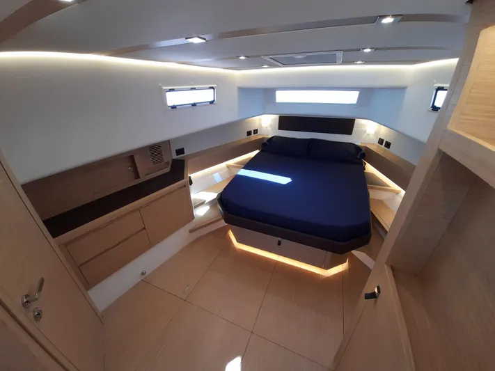 Yacht Photos Pics Luxurious cabin interior of 2023 Pardo Yachts 50 with modern design and ambient lighting.