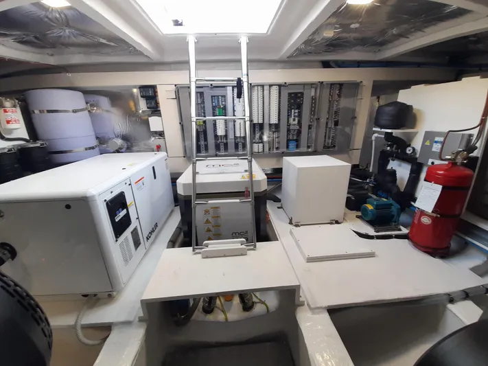  Yacht Photos Pics Engine room of 2023 Pardo Yachts 50, featuring Kohler generator and control panels.