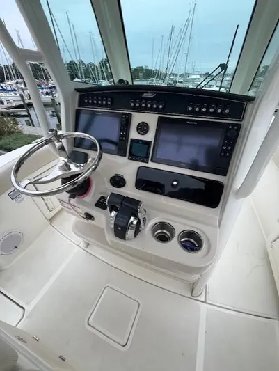  Yacht Photos Pics 2020 Boston Whaler 280 Outrage helm with advanced navigation controls and dual displays.