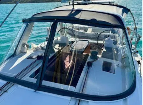 Wanderer Yacht Photos Pics 2019 Beneteau Oceanis 41.1 sailboat with dual steering wheels on turquoise water.