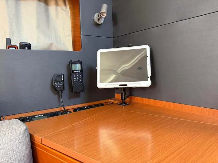 Wanderer Yacht Photos Pics Navigation station on 2019 Beneteau Oceanis 41.1 with tablet and communication devices.