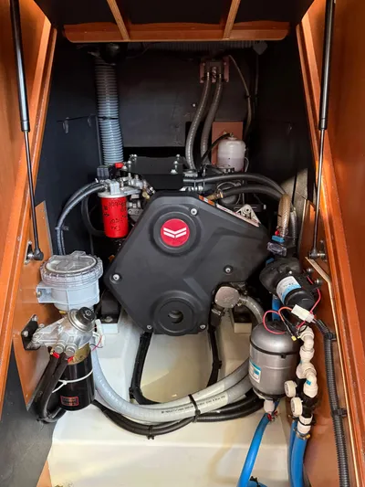 Wanderer Yacht Photos Pics Engine compartment of a 2019 Beneteau Oceanis 41.1 sailboat, showcasing mechanical components and systems.
