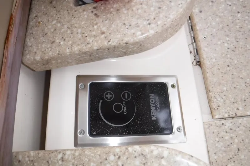  Yacht Photos Pics Kenyon control panel on 2014 Grady-White Freedom 335 boat interior.