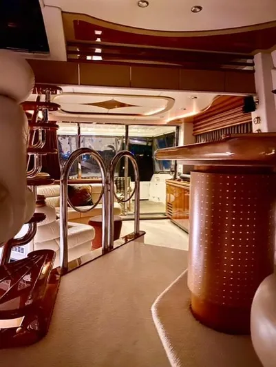 The Enterprise Yacht Photos Pics Luxurious interior of a 1995 Sunseeker MANHATTAN yacht with elegant furnishings and ambient lighting.