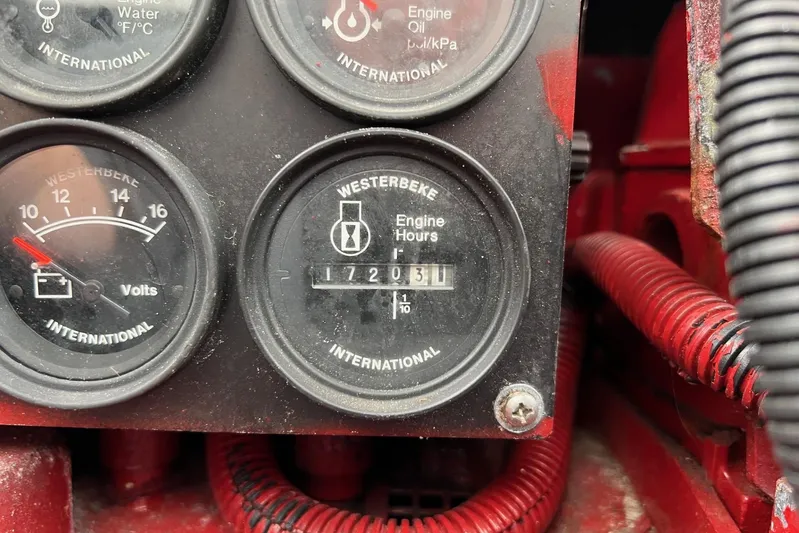  Yacht Photos Pics Close-up of Westerbeke engine hours and voltmeter on 2000 Sea Ray 400 Sedan Bridge.