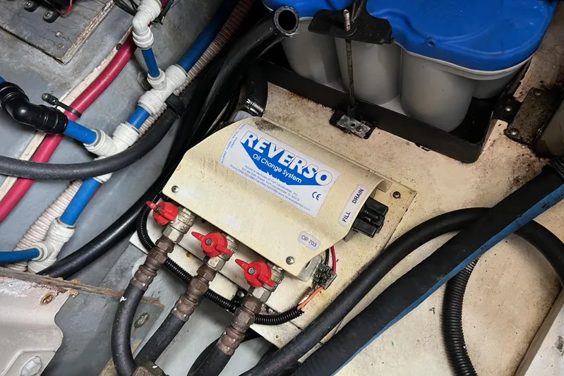  Yacht Photos Pics Engine compartment of 2000 Sea Ray 400 Sedan Bridge with Reverso oil change system.