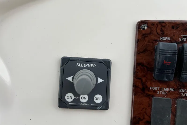  Yacht Photos Pics Control panel of a 2000 Sea Ray 400 Sedan Bridge with Sleipner thruster switch.