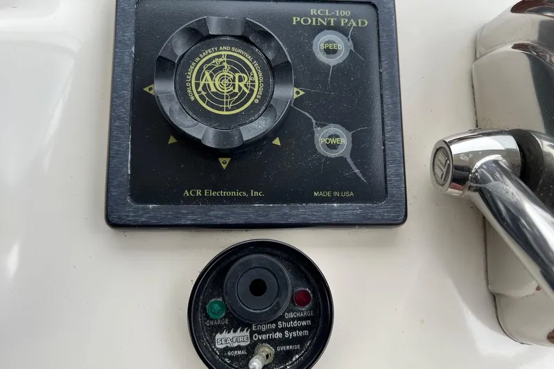  Yacht Photos Pics Control panel on 2000 Sea Ray 400 Sedan Bridge with ACR Electronics and Sea-Fire systems.