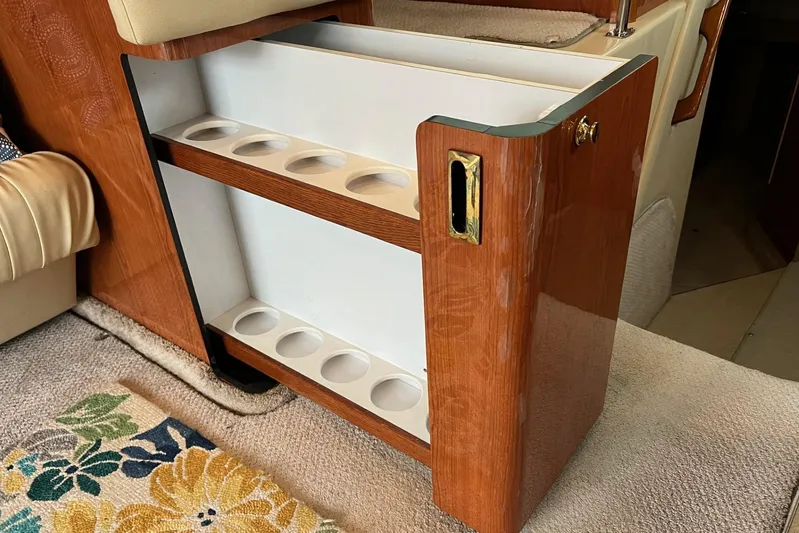  Yacht Photos Pics Cup holder cabinet on 2000 Sea Ray 400 Sedan Bridge yacht interior.