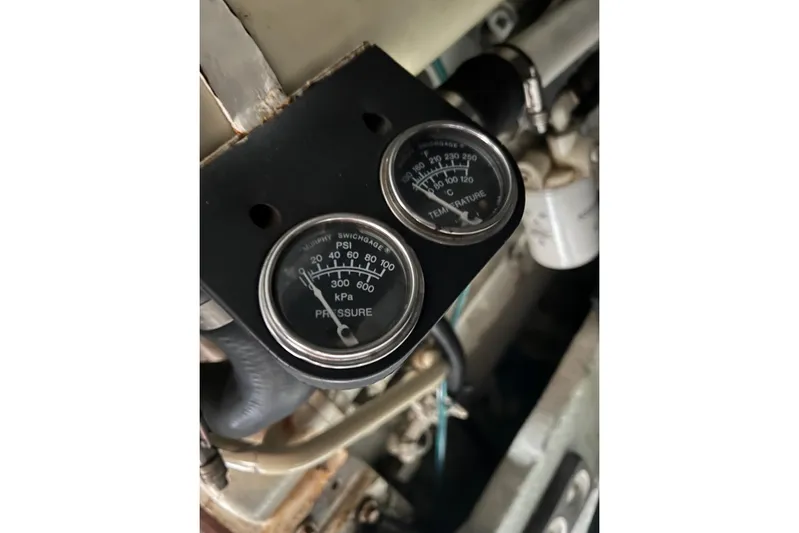  Yacht Photos Pics Close-up of pressure and temperature gauges on a 2000 Sea Ray 400 Sedan Bridge.