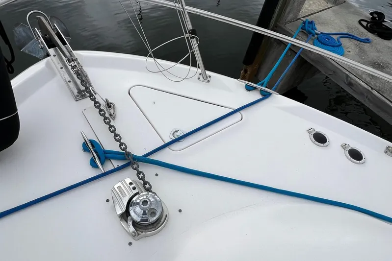  Yacht Photos Pics Bow of 2000 Sea Ray 400 Sedan Bridge with anchor chain and blue mooring lines.