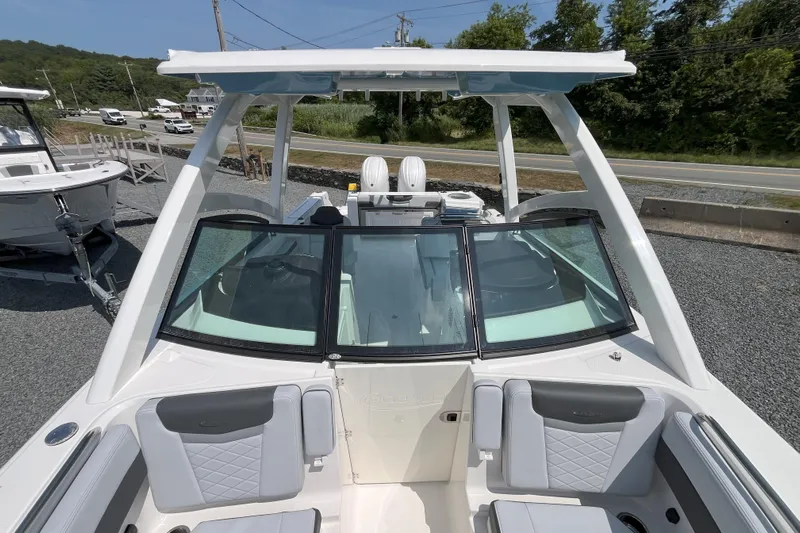  Yacht Photos Pics 2026 Robalo R257 Dual Console boat with sleek design and spacious seating.
