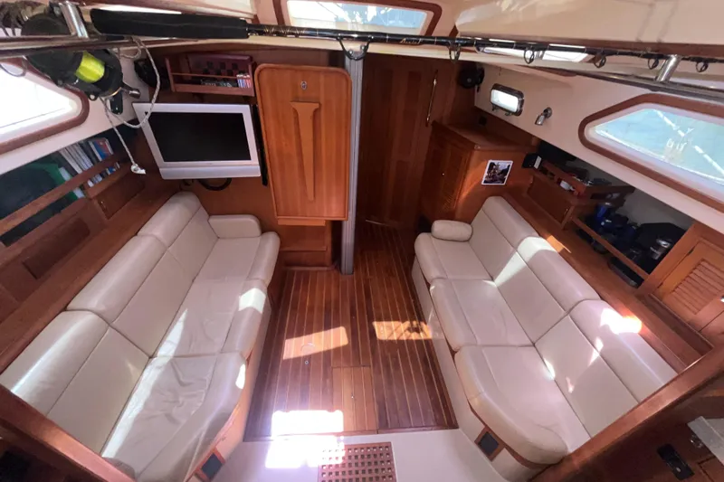 Ruby Lee Yacht Photos Pics Luxurious interior of 2006 Island Packet 445 yacht with leather seating and wood finish.