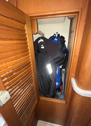 Ruby Lee Yacht Photos Pics Closet inside 2006 Island Packet 445 yacht with hanging clothes.