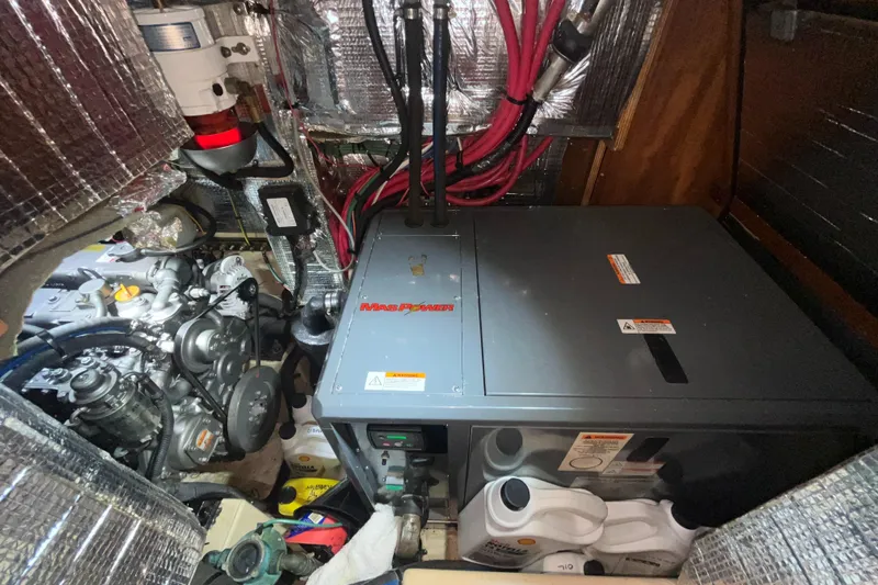 Ruby Lee Yacht Photos Pics Engine room of 2006 Island Packet 445 sailboat with generator and equipment.