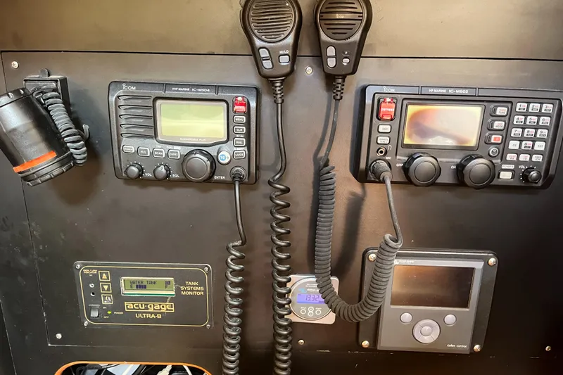 Ruby Lee Yacht Photos Pics Control panel of a 2006 Island Packet 445 sailboat with communication equipment.