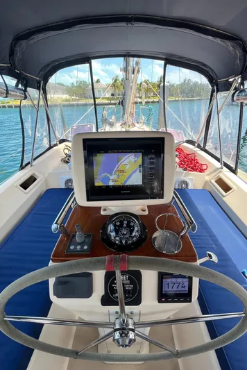 Ruby Lee Yacht Photos Pics 2006 Island Packet 445 yacht cockpit with navigation equipment and steering wheel.