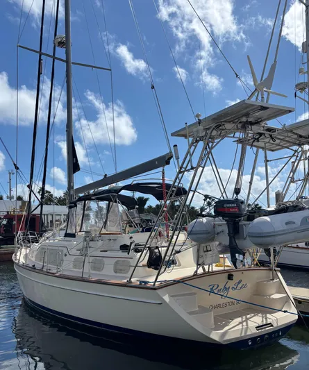 Ruby Lee Yacht Photos Pics 2006 Island Packet 445 sailboat docked under a clear blue sky.