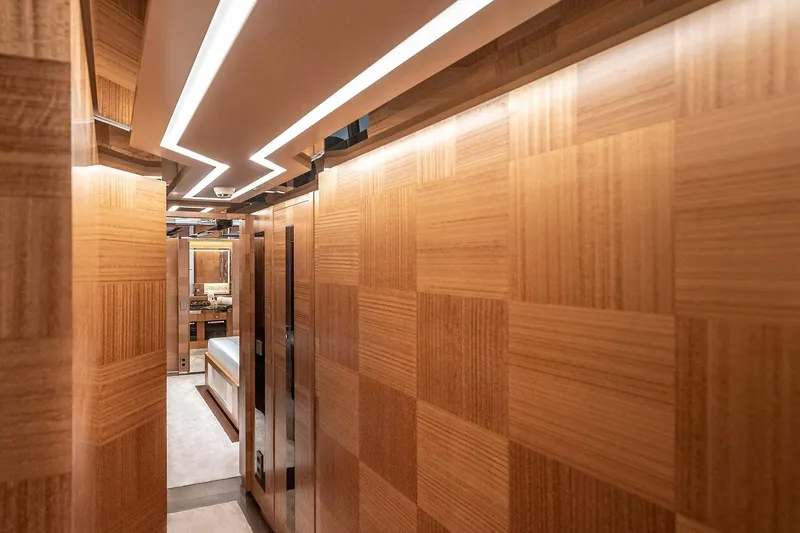 Sunrise Yacht Photos Pics Luxurious Yildiz 141 yacht interior hallway with modern wood paneling, 2019 model.