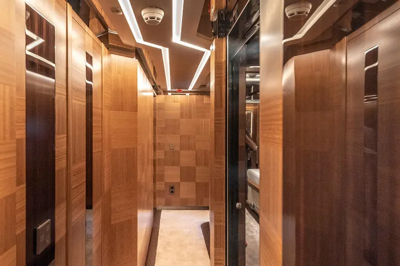 Sunrise Yacht Photos Pics Luxurious wooden interior of 2019 Yildiz 141 yacht with modern lighting.