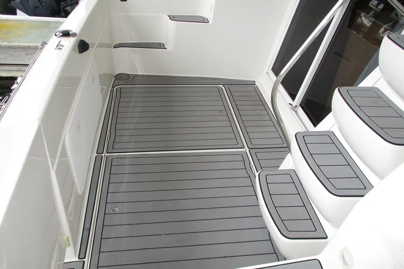 New Lease On Life Yacht Photos Pics 2004 Meridian 340 boat deck with gray non-slip flooring and steps.